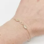 Sárga arany modern karlánc cirkóniákkal