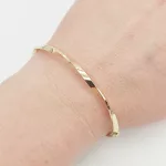 Sárga arany csavart karperec