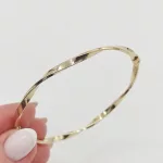 Sárga arany csavart karperec