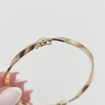 Sárga arany csavart karperec