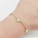 Sárga arany karlánc metszett lóherékkel