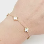 Sárga arany karlánc gyöngyház lóherékkel