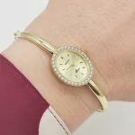 Sárga arany női karperec óra