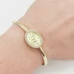 Sárga arany női karperec óra