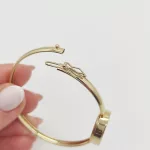 Sárga arany női karperec óra