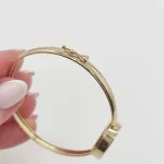 Sárga arany női karperec óra