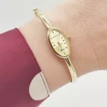 Sárga arany női karperec óra