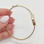 Sárga arany női karperec óra