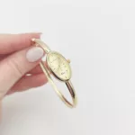 Sárga arany női karperec óra