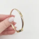 Sárga arany női karperec óra