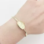 Sárga arany női karperec óra