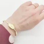 Sárga arany női karperec óra