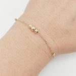 Sárga arany karlánc metszett bogyókkal