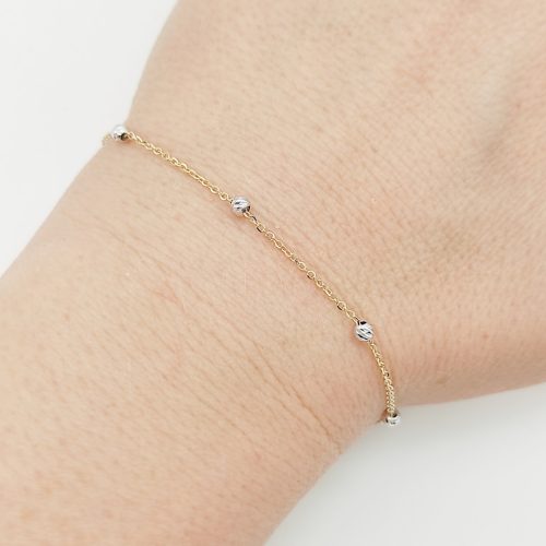 Sárga arany karlánc metszett fehér bogyókkal