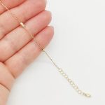 Sárga arany karlánc metszett orsókkal