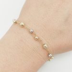 Sárga arany karlánc sárga-fehér metszett bogyókkal