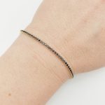 Sárga arany karlánc fekete cirkóniákkal