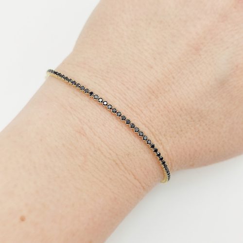 Sárga arany karlánc fekete cirkóniákkal