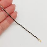 Sárga arany karlánc fekete cirkóniákkal