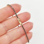 Sárga arany karlánc fekete cirkóniákkal