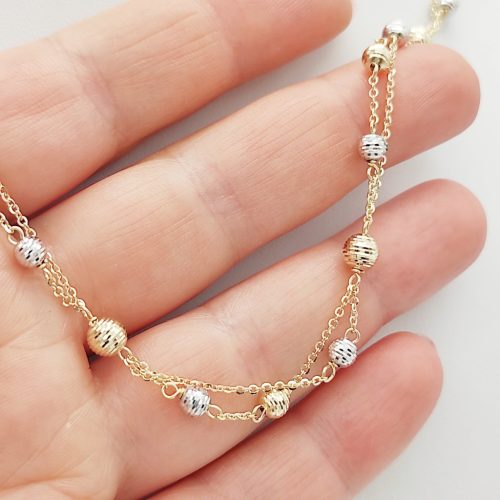 Sárga arany dupla soros nyaklánc sárga-fehér metszett bogyókkal