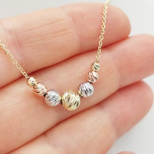 Sárga arany nyaklánc trikolor metszett bogyókkal