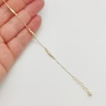 Sárga arany karlánc metszett orsókkal