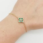 Sárga arany karlánc zöld virág medállal