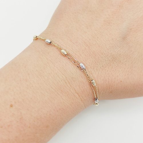 Sárga arany dupla soros karlánc sárga-fehér metszett orsókkal