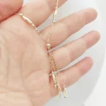 Sárga arany nyaklánc metszett orsókkal