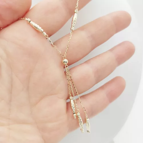 Sárga arany nyaklánc metszett orsókkal