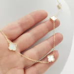 Sárga arany nyaklánc 5 gyöngyház lóherével