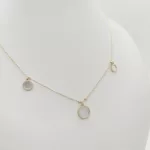 Sárga arany nyaklánc gyöngyház függőkkel