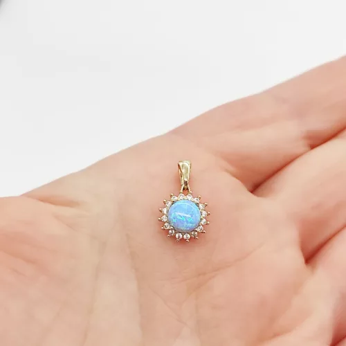 Sárga arany medál kék opállal