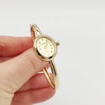 Sárga arany női karperec óra