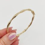 Sárga arany csavart metszett karperec