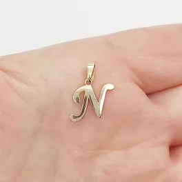 Sárga arany írott "N" betű medál