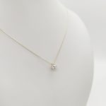 Sárga arany nyaklánc egy köves 6 karmos medállal