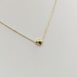 Sárga arany nyaklánc apró szív medállal