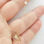 Sárga arany nyaklánc kis gyönggyel