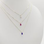 Sárga arany nyaklánc piros kis cseppel