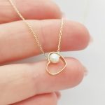 Sárga arany nyaklánc kis szívvelés gyönggyel