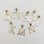 Arany "H" betű medál