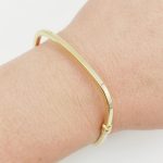 Sárga arany szögletes modern karperec