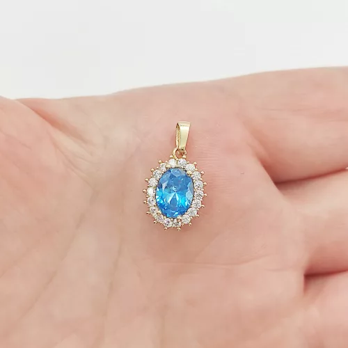 Sárga arany nagy világoskék köves medál