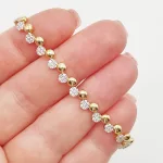 Sárga arany virágos köves karlánc