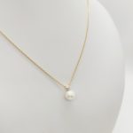 Sárga arany nyaklánc gyönggyel és cirkóniával