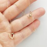 Sárga arany nyaklánc gyémánt szív medállal