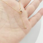 Sárga arany nyaklánc gyémánt medállal