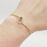 Sárga arany karperec gyémánttal és smaragddal